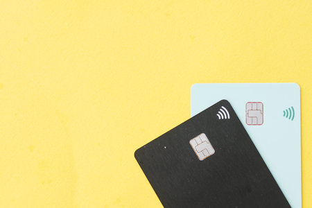 wireless bank card on yellow background