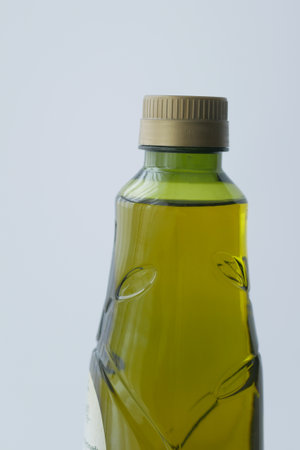 a bottle of olive oil on white backgroundの写真素材
