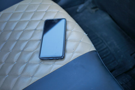 forget smartphone on car sit, lost smart phoneの写真素材