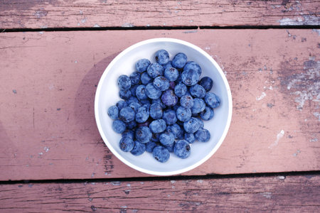 Close up of fresh blue berry with water drops .の写真素材