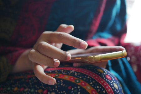 close up of women hand holding smart phoneの写真素材