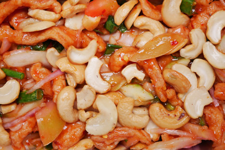 cashew nut salad on a plate on tableの写真素材