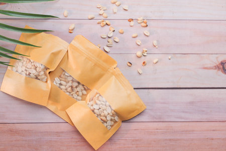 Sugar Substitute sweetener packet and tea cup on white backgroundの写真素材