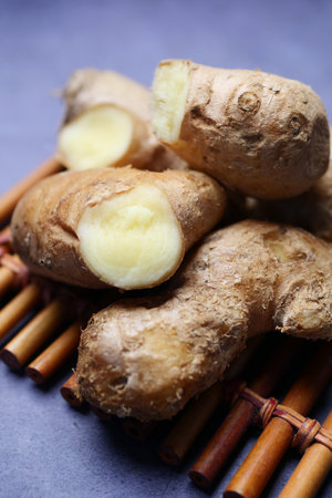 Close up of Gingers on chopping board.の写真素材