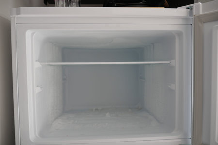 open empty fridge at home