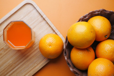 fresh fruits and orange juice on table