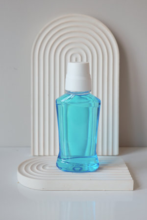 mouthwash liquid in a container on tableの写真素材