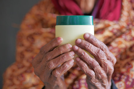 elderly woman using petroleum jelly