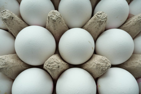 close up of eggs in a bowl.