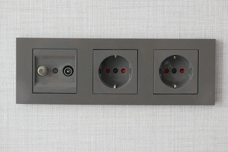 Electrical cable switch for plugin on wall