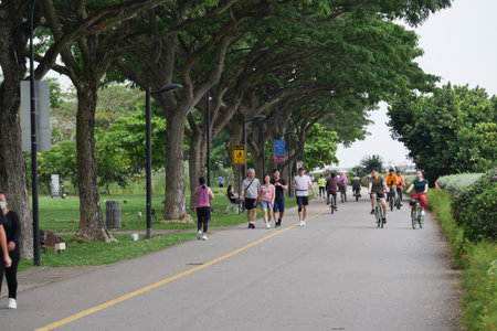 singapore 21 august 2022, cycling and walking in the park in singaporeのeditorial素材