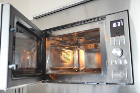 open electric oven at homeの写真素材