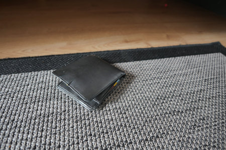 left wallet on floor at home