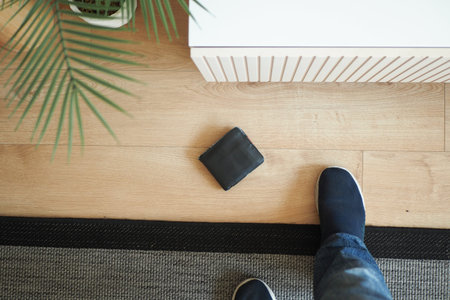 left wallet on floor at homeの写真素材