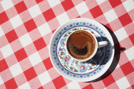 a cup of turkish coffee on table outdoorの写真素材