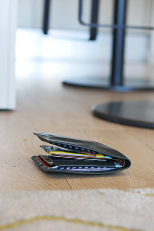 left wallet on floor at home