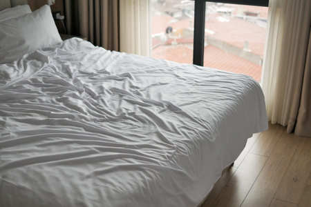 messy bed in early morning , messy bed after waking upの写真素材