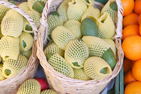 many avocado display for sale at local storeの写真素材