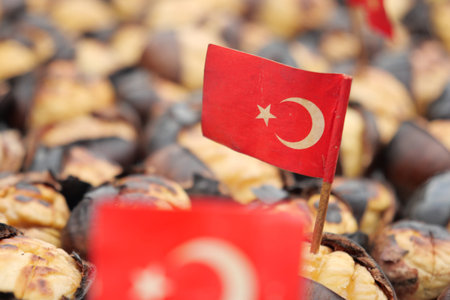 turkish flag on traditional Istanbul street food grilled chestnuts in a row