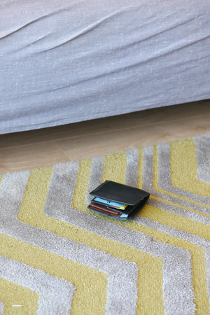 left wallet on floor at home