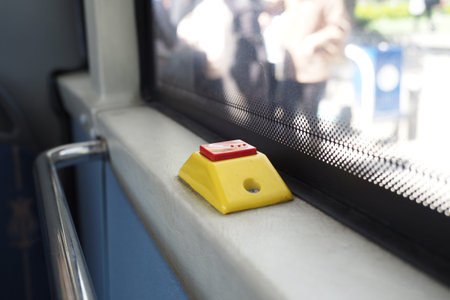 Closeup of Bus bell switch for stop inside the public bus