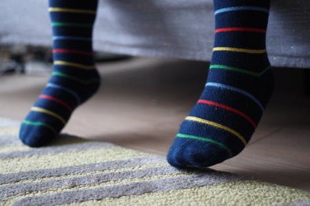 a colorful soft socks on child feet .の写真素材