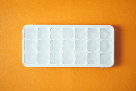 close up of many ice cubes on white background