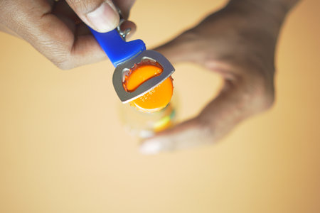 Metal cap and opener on the glass bottleの写真素材