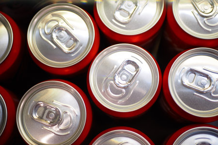 Cans of soft drink lined up ,の写真素材