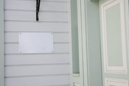 Street signboard mockup on modern city buildingの写真素材