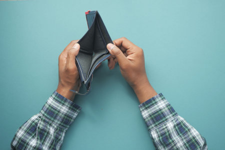 Man hand open an empty wallet with copy space.の写真素材