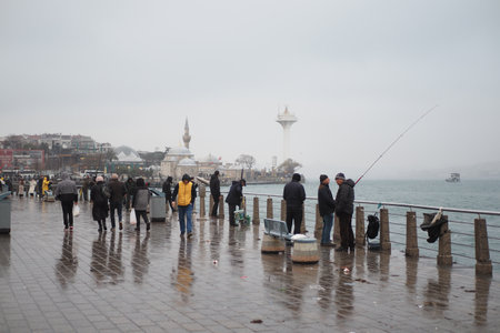 Turkey istanbul 12 january 2023. Fisherman with rod, spinning reelのeditorial素材