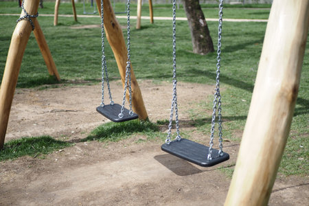 Close-up of a baby swing in the playground