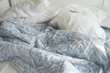 messy bed in early morning , messy bed after waking up