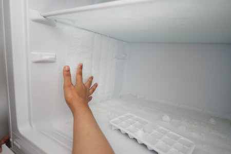 open empty fridge at homeの写真素材