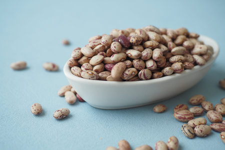 Closeup of brown soy beans in a bowl on table