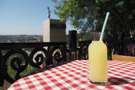 glass of orange juice outdoorの写真素材
