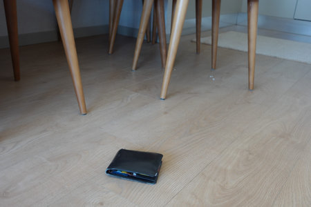 left wallet on floor at home
