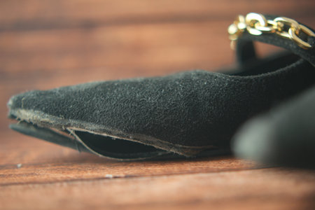 damaged women old worn torn shoes,の写真素材