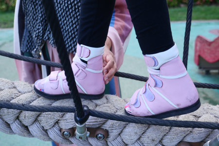 Child cerebral palsy disability, legs orthosis.の写真素材