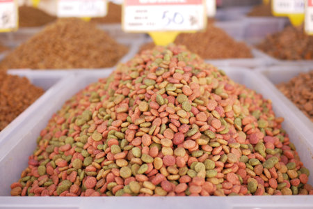 stack of dried cat food display for sale at local marketの写真素材
