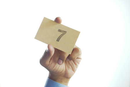 Number 7 icon, brown stick note isolated on white background