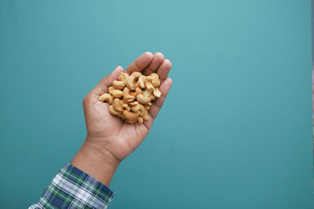 top view of cashew nuts on handの写真素材