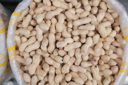 peeled peanuts in a bowl on table