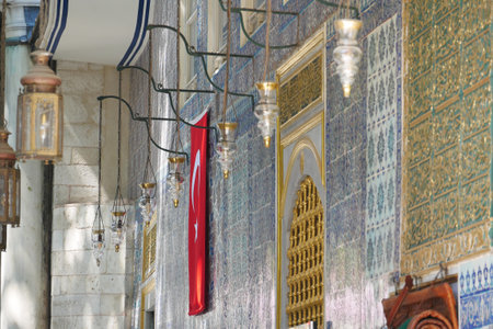 turkey istanbul 22 may 2023. Turkish flag on the wall of a Eyup Sultan mosqueのeditorial素材
