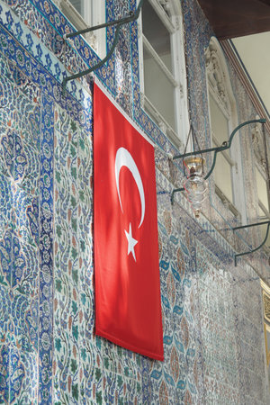 turkey istanbul 22 may 2023. Turkish flag on the wall of a Eyup Sultan mosqueのeditorial素材