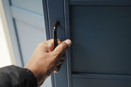 hand opening bedroom cabinet doorの写真素材