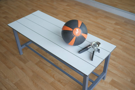 Gym Equipment or Dumbbell Kettlebell in a gym bench