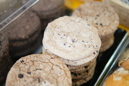 sweet cookies in a transparent jar display for sale at cafeの写真素材