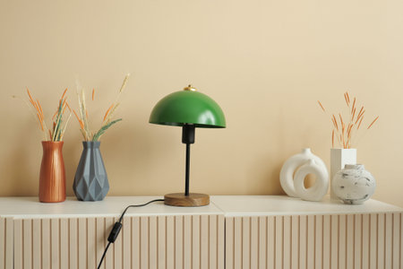 table lamp against orange color wall in bed roomの写真素材